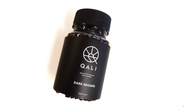 QALI branded bottle of 1000 dark brown beads